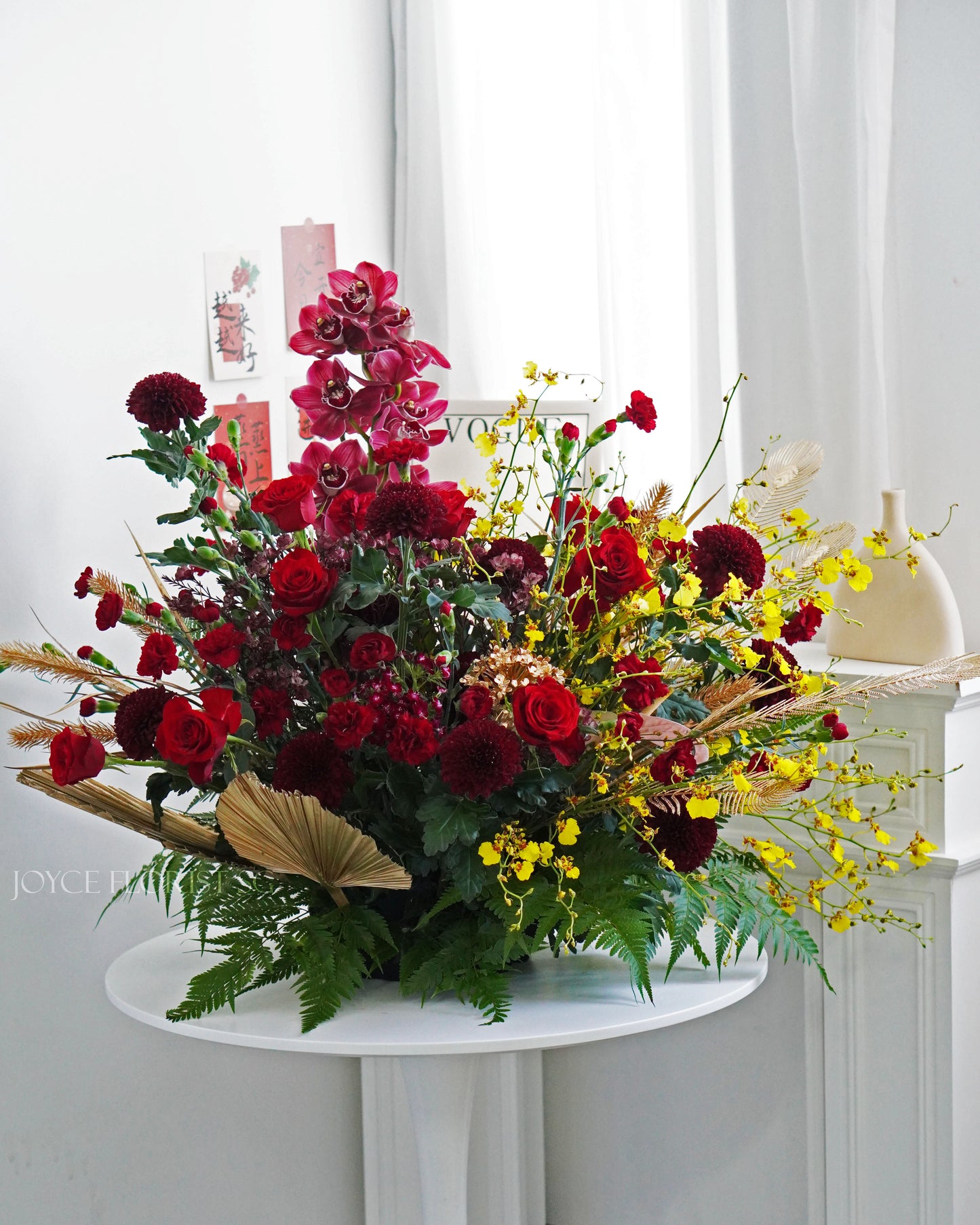 Red Rose With Cymbidium Orchid Basket Arrangement
